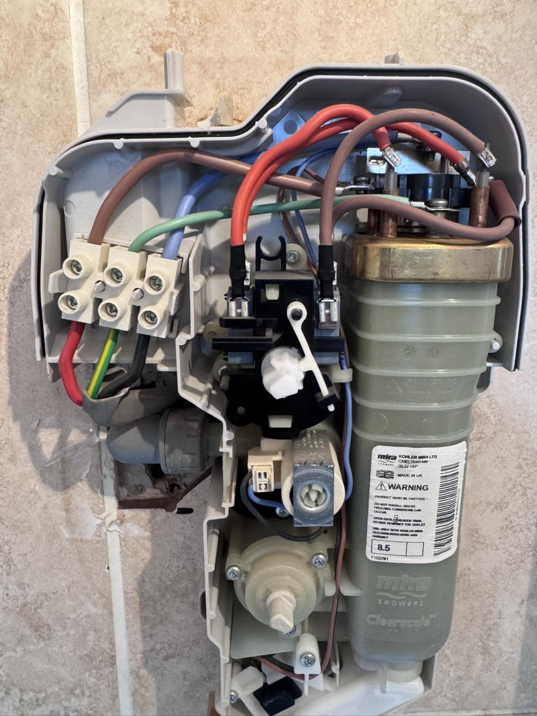 Modern shower valve repair in a contemporary bathroom